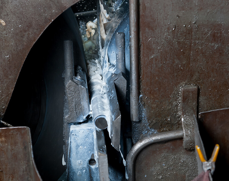 Piece of steel receiving through-feed grinding